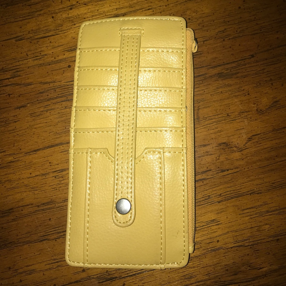 Cute flat wallet in mustard yellow.